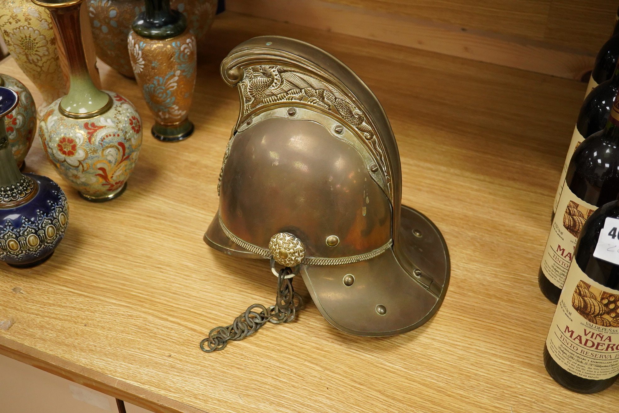 A 20th century theatrical British Metropolitan brass fireman’s helmet, 21cm high
